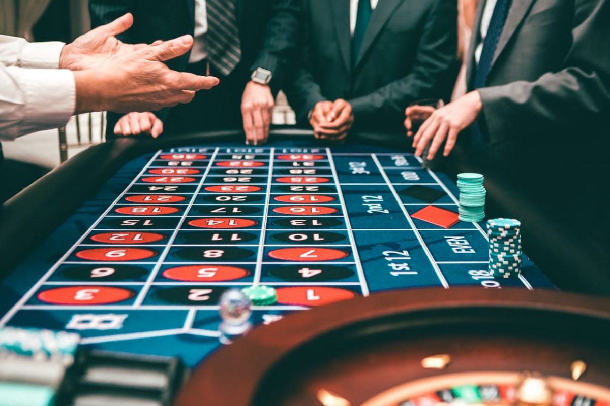 men playing roulette in casino